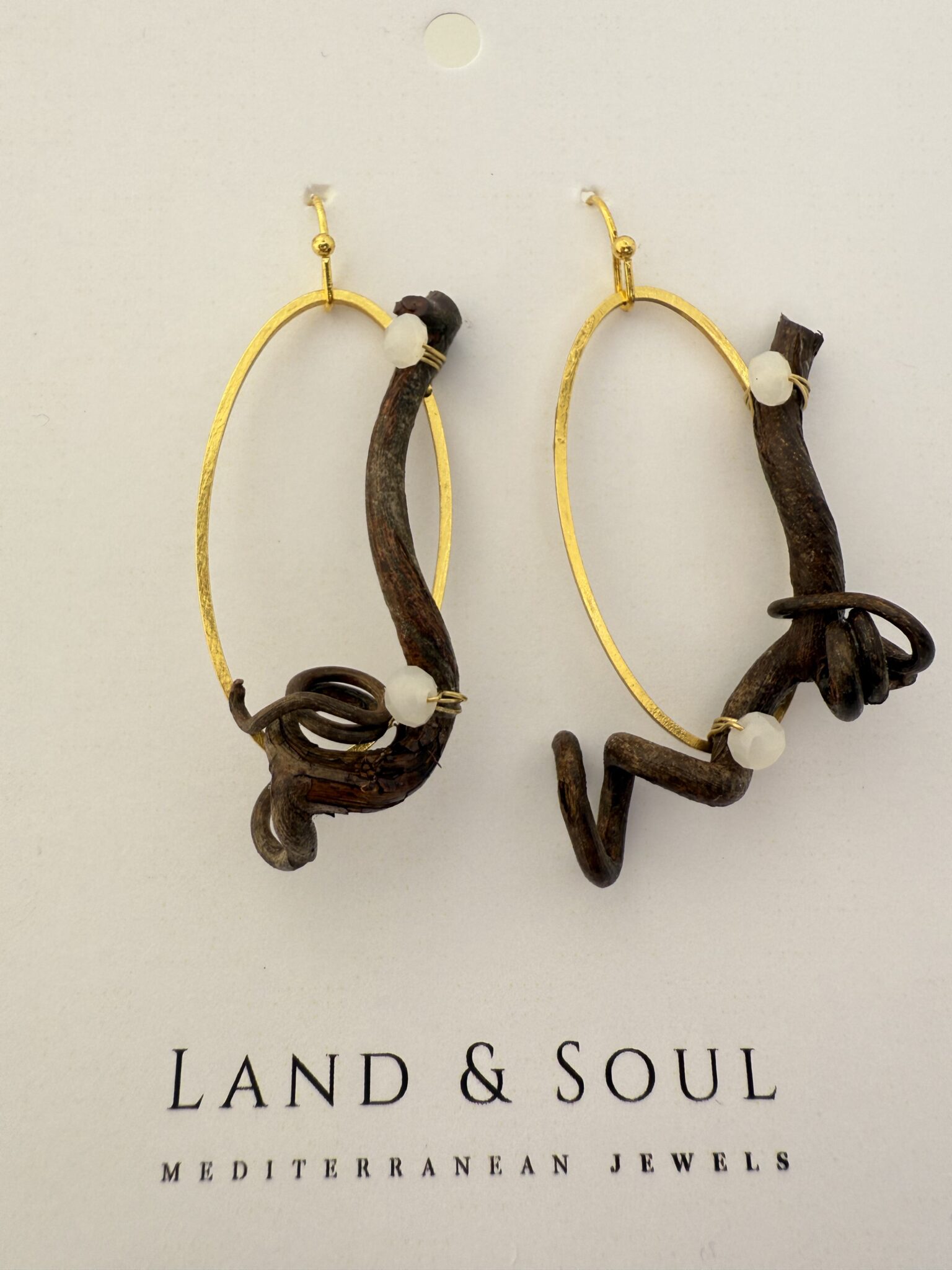 pendientes de zarcillos de vid y cristales tallados colo blanco